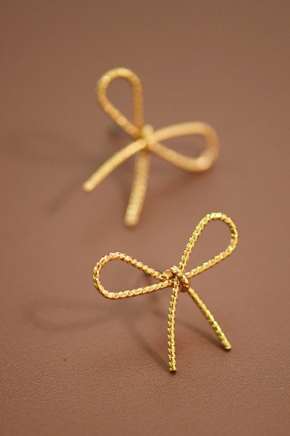 Gold Bow Knot Stud Earrings with Textured Finish